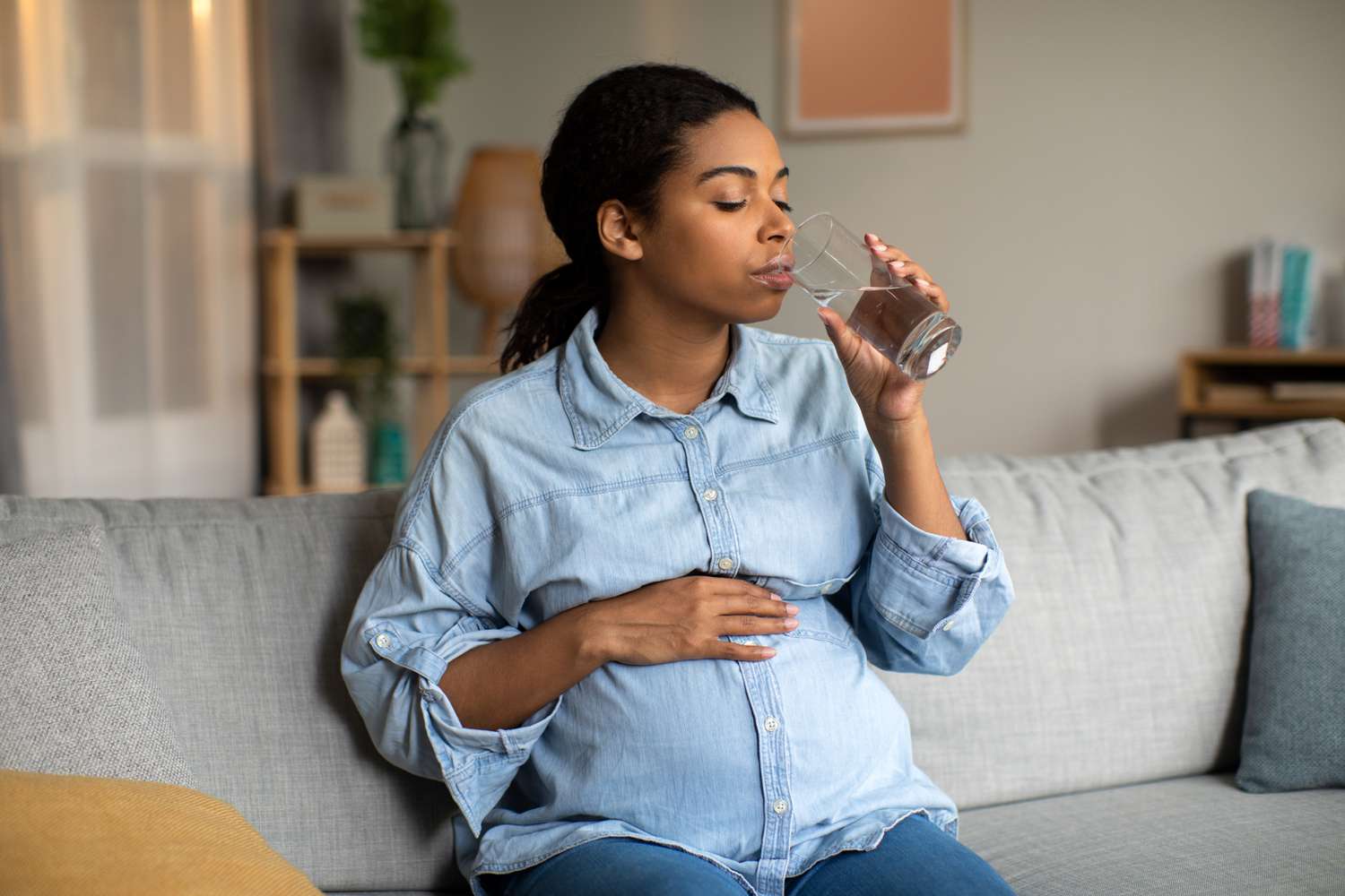 A picture of pregnant-woman-dring-cold-water